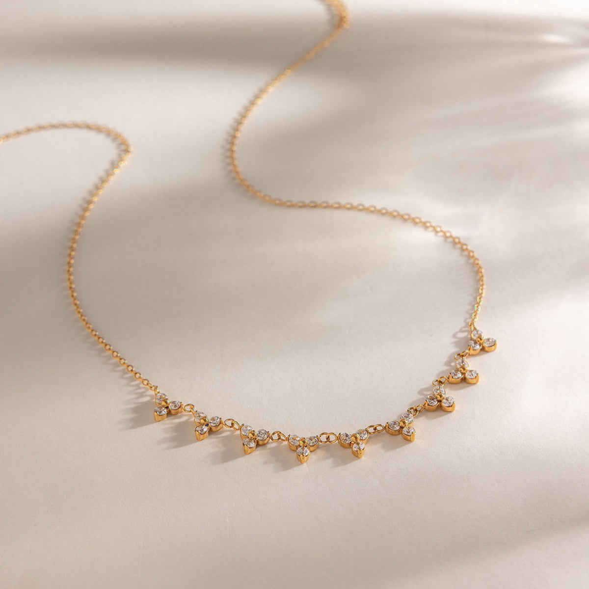 Nasereen Garland Necklace — Draped on Satin | Pellington