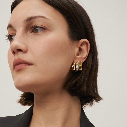 Load image 1 in gallery view. Wearing Flame Earrings. Shop 18k Gold Plated hoops at Mithra and Co.