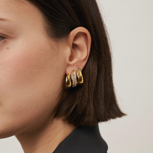 Load image 1 in gallery view. Wearing 18k Gold Plated hoop Earrings. Buy Flame Earrings Online at Mithra and Co.