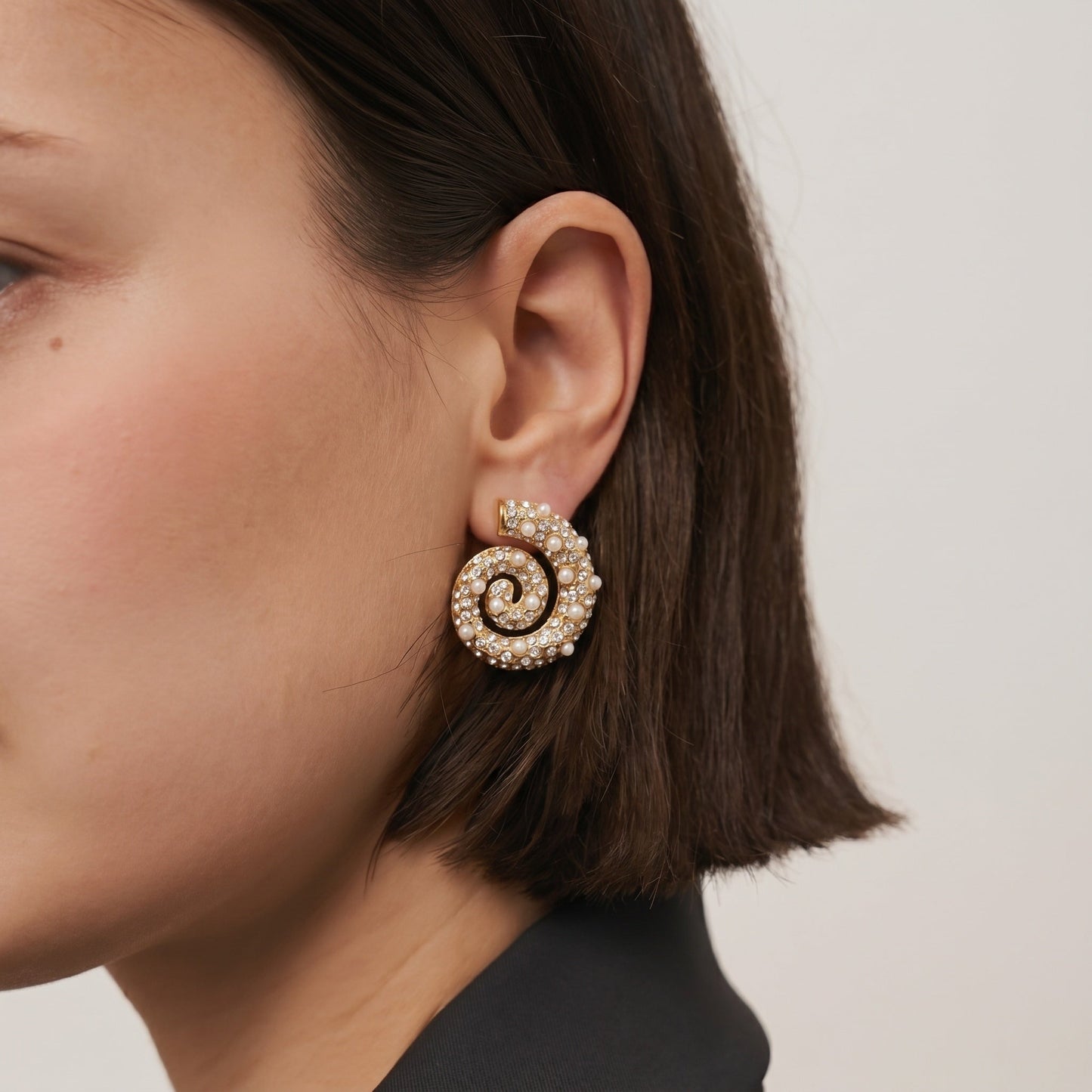 Corum Spiral Earrings — On Model | Pellington UAE