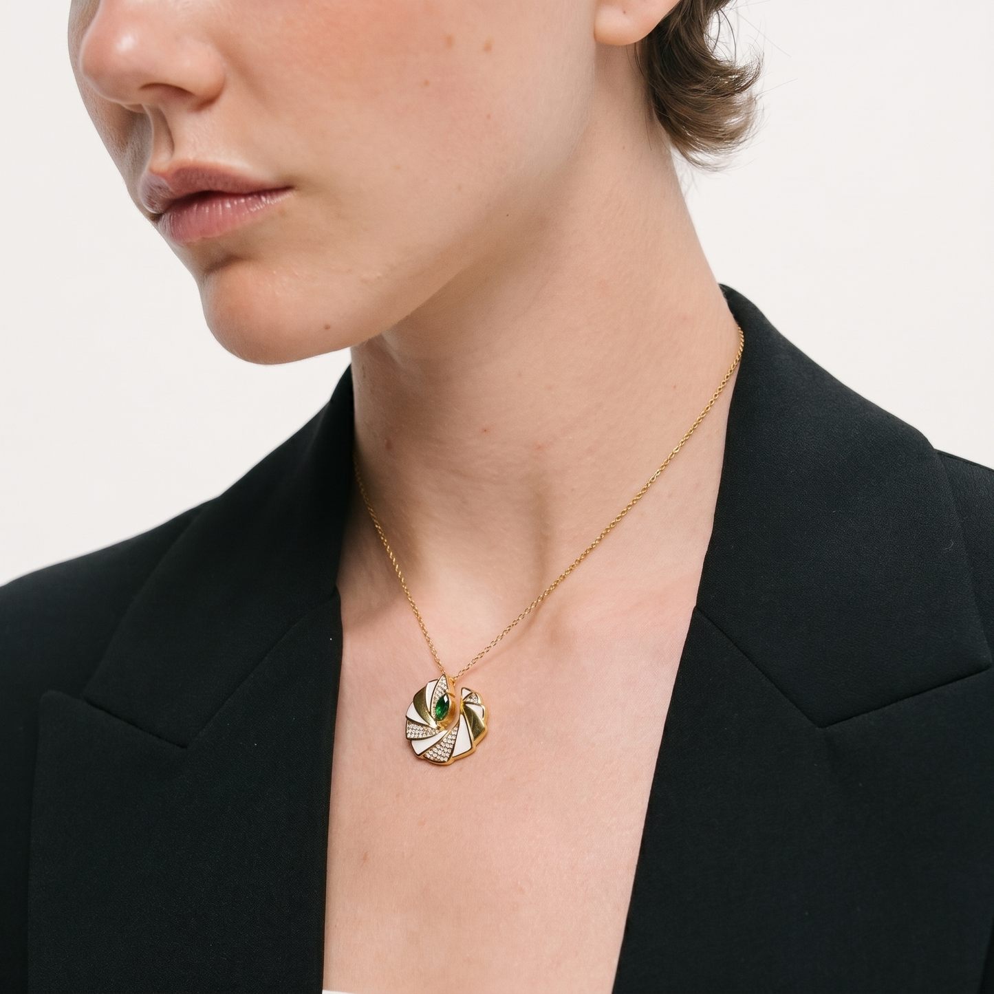 Woman wearing Khudra Pinwheel Pendant Necklace | Pellington