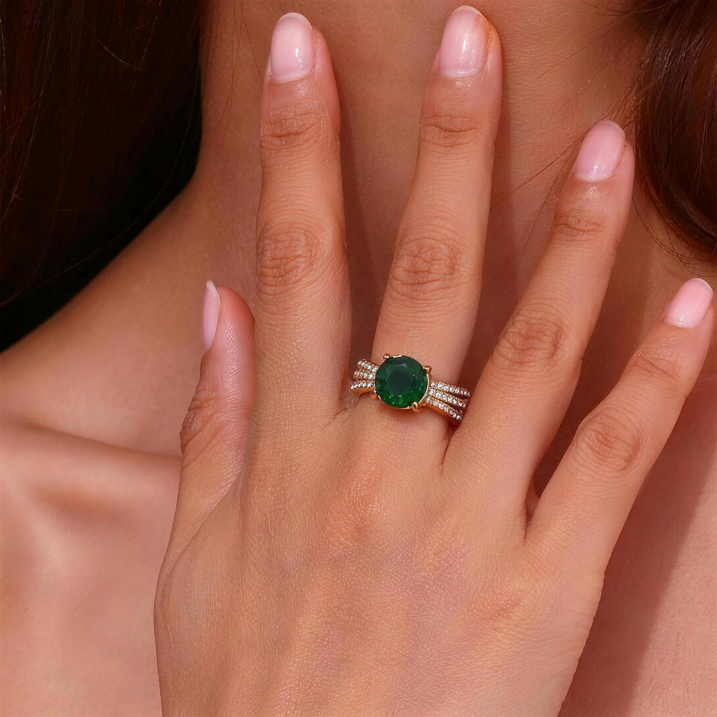 Mawj Emerald ring worn on model